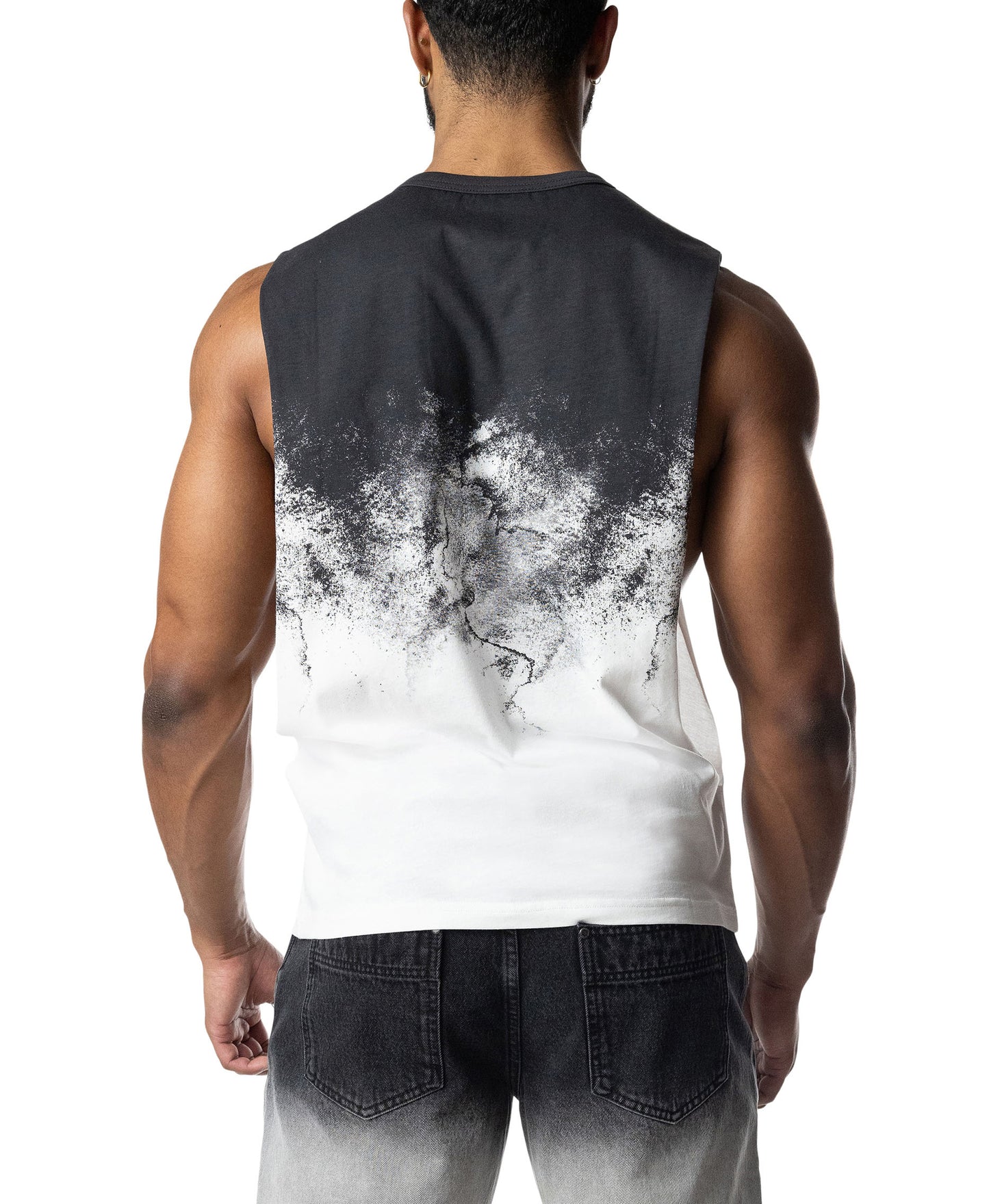 Person wearing a sleeveless shirt with a black and white design on the back
